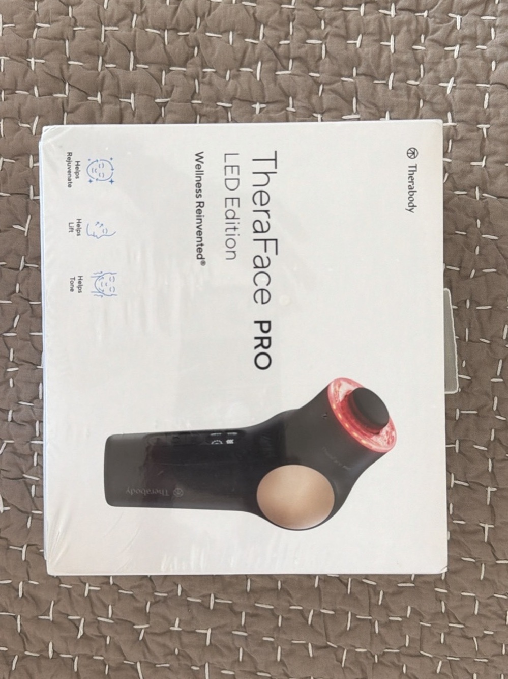 Therabody White and Silver Device Packaging